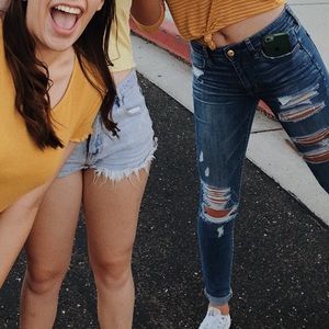 Dark blue ripped jeans